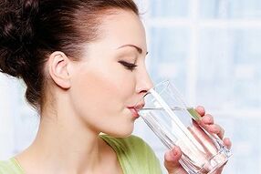 girl drinks water with a diet for the lazy